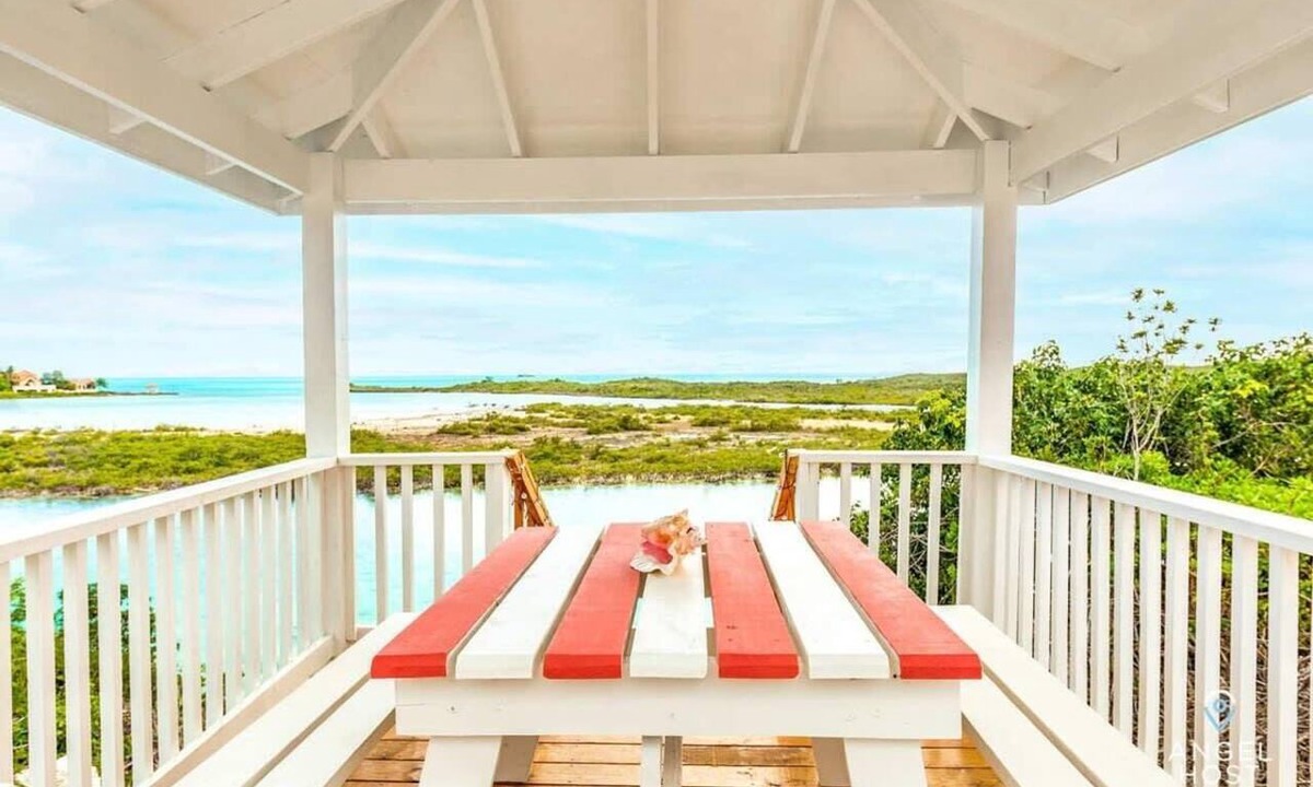 Ocean Point House | Cottage on Chalk Sound: Sunset Views & Dock