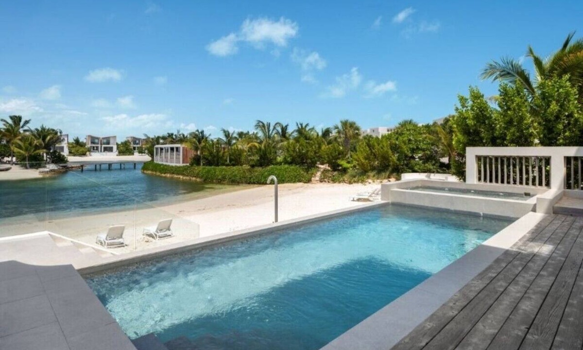 Long Bay Hills Hotel | Exclusive 5BR Island Retreat with Hot Tub, Rooftop Living & Lagoon Access