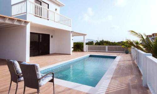 Leeward Settlement House | Family-ready Fully Equipped Grand Villa with Pool