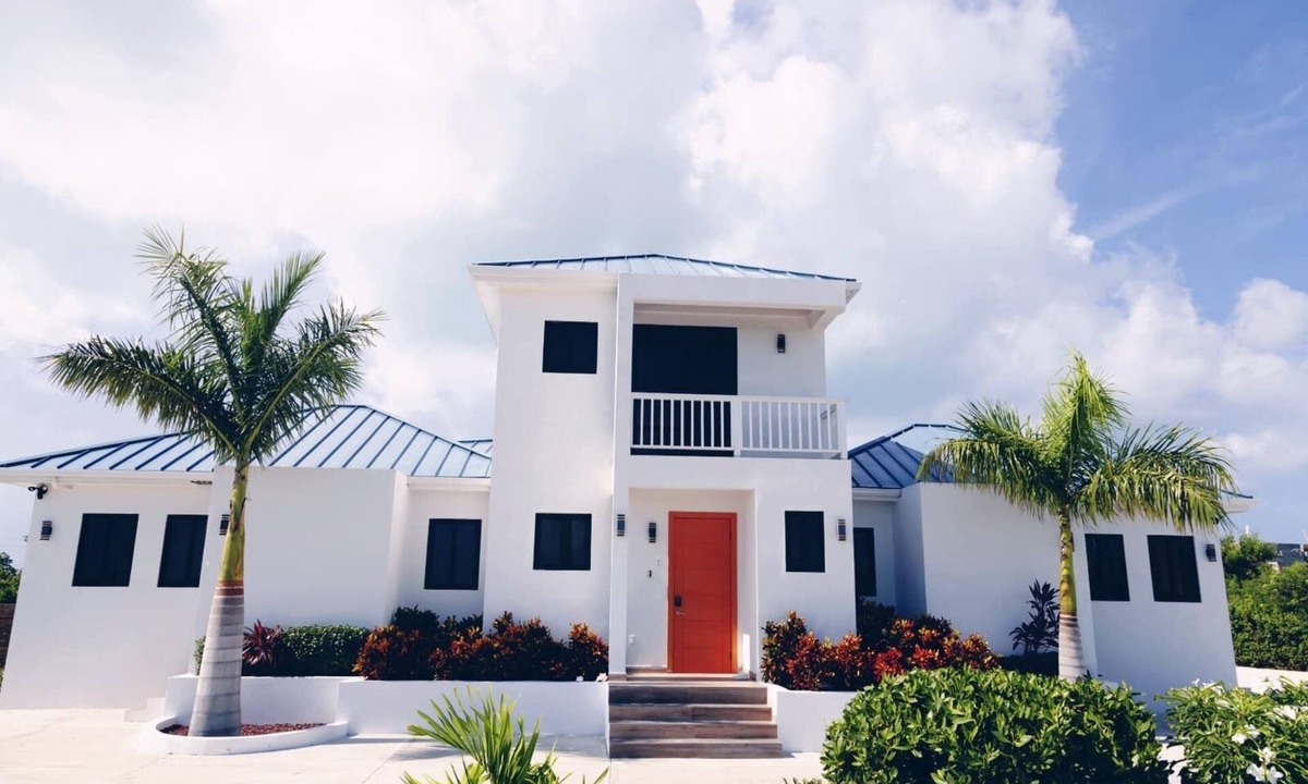 Leeward Settlement Apartment | Poolside Escape with Private Balconies, Near Beach