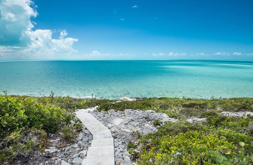 Leeward Settlement Villa | 30% off October. Popular ocean front villa with great service and great value.