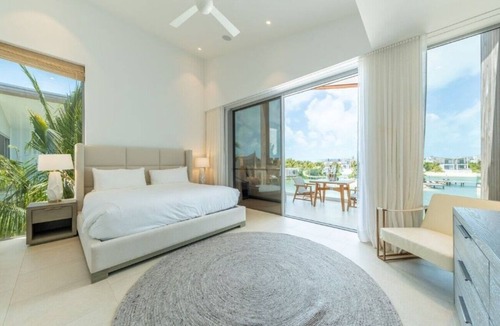 Long Bay Hills Hotel | Barefoot Luxury on the Lagoon with Private Pool & Easy Paddleboarding Access