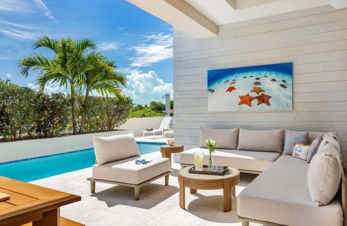 Leeward Settlement Villa | Canal Front Villa w/Pool & Balcony Views