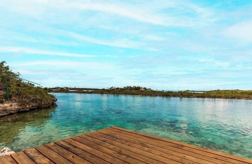 Ocean Point Apartment | Chalk Sound Waterfront w/Lagoon Views & Dock