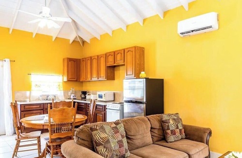 Ocean Point House | Cottage on Chalk Sound: Sunset Views & Dock