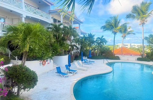 Providenciales Apartment | Cozy retreat located at Queen Angel Resort, step away from beautiful beach