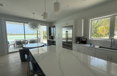 Sandy Point House | Enchanting Luxury Beachfront Villa Stillwater in Sandy Point views of Parrot Cay