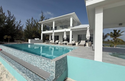 Sandy Point House | Enchanting Luxury Beachfront Villa Stillwater in Sandy Point views of Parrot Cay