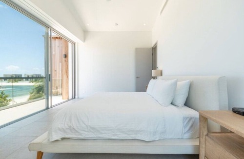 Long Bay Hills Hotel | Exclusive 6BR Island Retreat with Guest House, Full Kitchen & Lagoon Living