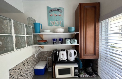 The Bight Apartment | Grace Bay Getaway: Beachwalk Compact Studio with shared Pool and Free Parking