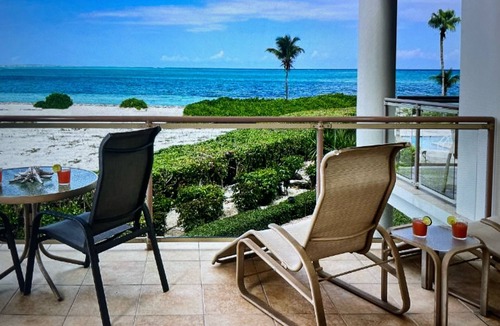 The Bight Condo | Ocean view luxury on 2 levels. Coral Gardens at snorkel reef on Grace Bay Beach