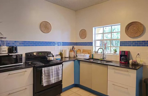 Providenciales Apartment | Pelican View #1 ground floor beachfront apartment