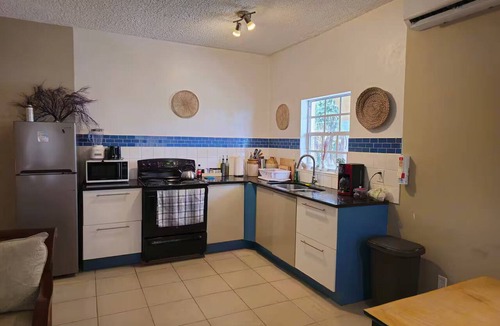 Providenciales Apartment | Pelican View #1 ground floor beachfront apartment