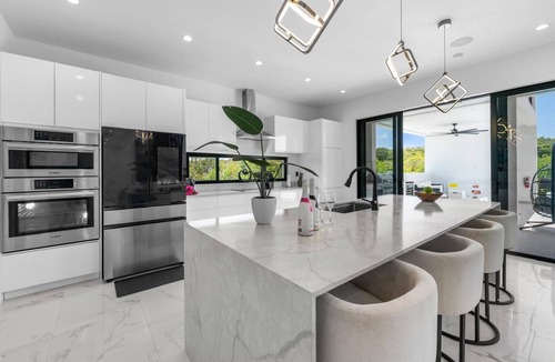 Long Bay Hills Villa | Poolside Villa with BBQ, Fire Pit & Near Beach