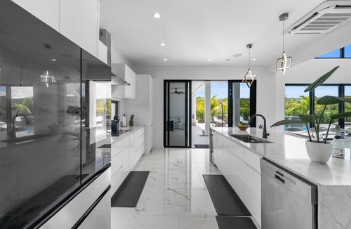 Long Bay Hills Villa | Poolside Villa with BBQ, Fire Pit & Near Beach