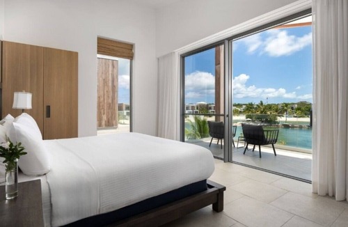 Long Bay Hills Hotel | Unwind in a Lagoon Villa with Private Pool, Hot Tub, Rooftop Patio & Beach Acces