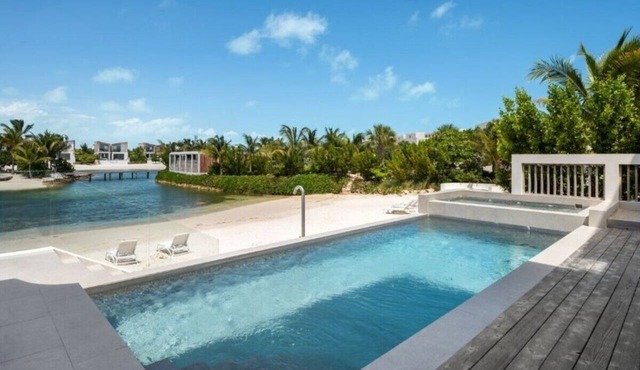 Exclusive 5BR Island Retreat with Hot Tub, Rooftop Living & Lagoon Access in Long Bay Hills
