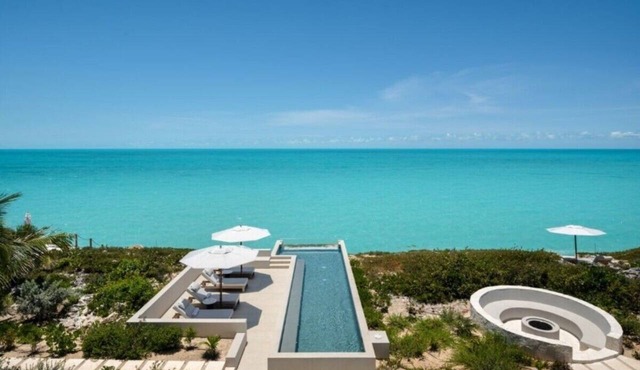 Exclusive Ocean Estate with 2 Guest Houses, Infinity Pool & Private Sea Access in Long Bay Hills