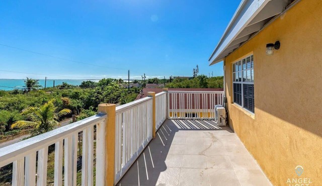 Lagoon-View Balcony Near Beaches & Water Sports in Bottle Creek