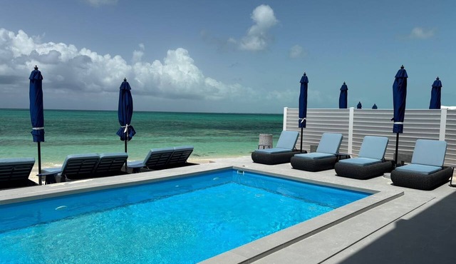 New - Aqua Blu BEACHFRONT Villa- "The Palm" Oceanfront - 4 King Bedrooms in Providenciales