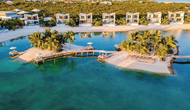 Unwind in a Lagoon Villa with Private Pool, Hot Tub, Rooftop Patio & Beach Acces in Long Bay Hills