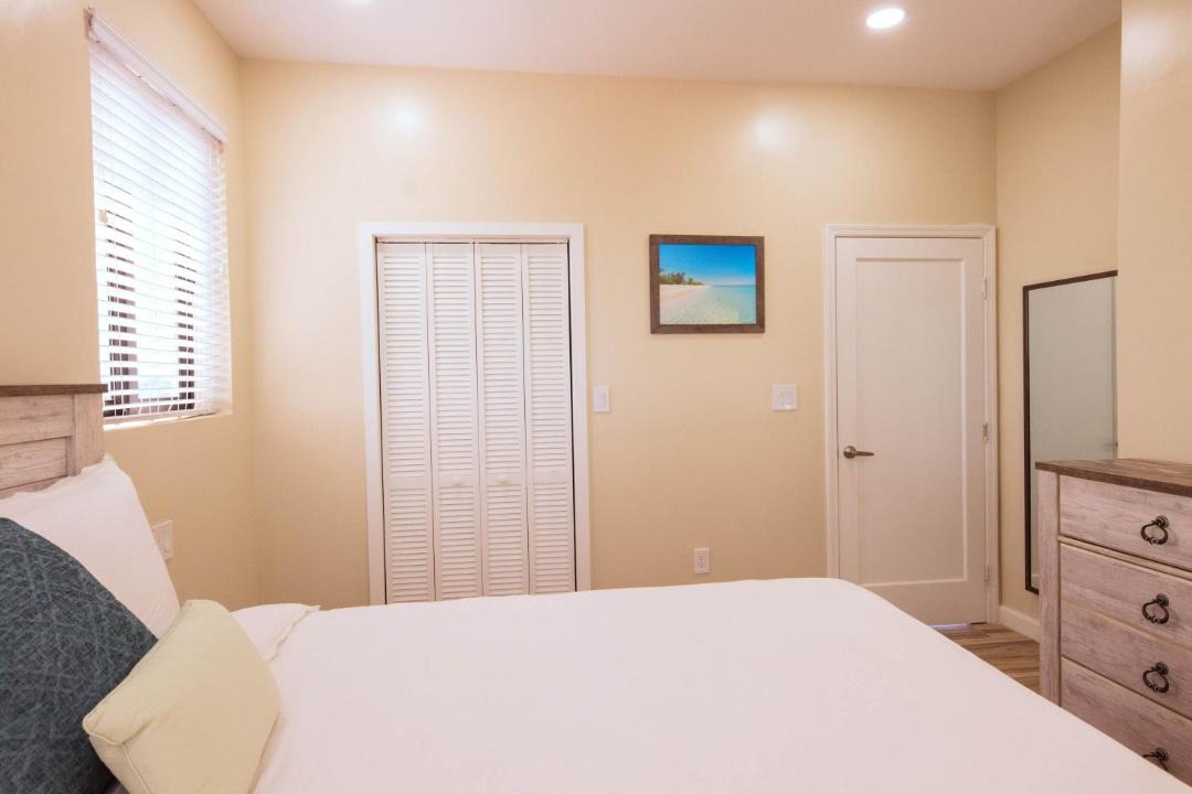 Leeward Settlement Apartment | Stay in a Long Bay Beach Villa with a Shared Pool