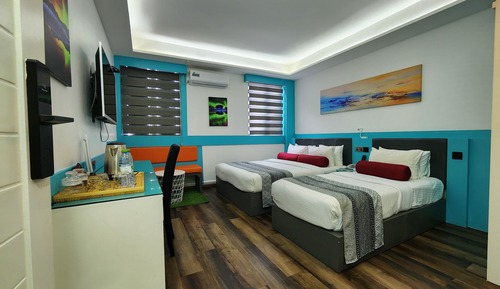 Deluxe Triple Room, City View