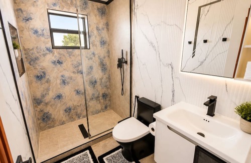 Discovery Bay Apartment | Villa Camila Unit 1: Modern, Central Villa with Tranquil Charm