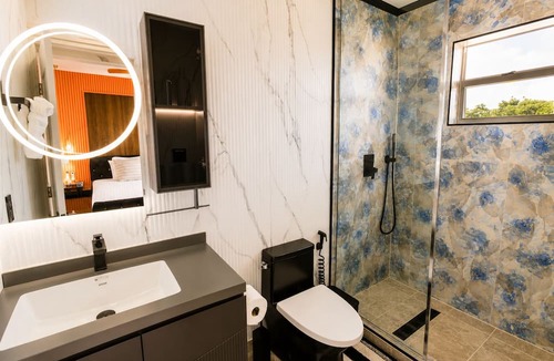 Discovery Bay Apartment | Villa Camila Unit 1: Modern, Central Villa with Tranquil Charm
