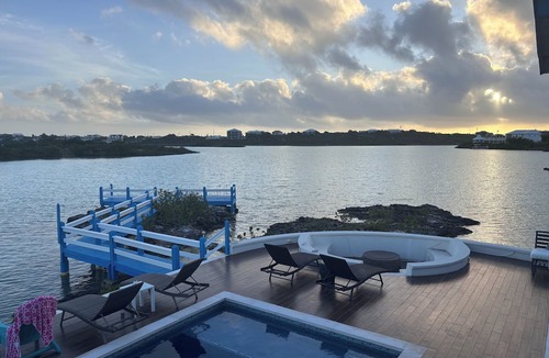 Ocean Point Villa | Villa Patina—True TC Islands style with private dock and beach on Chalk Sound