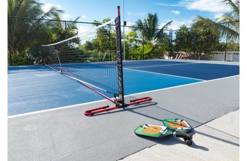 Caicos Islands Villa | Wakesurf Villa Waterfront Retreat with Dock Kayaks and Pool