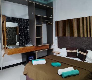 Thoddoo House | Palm Garden