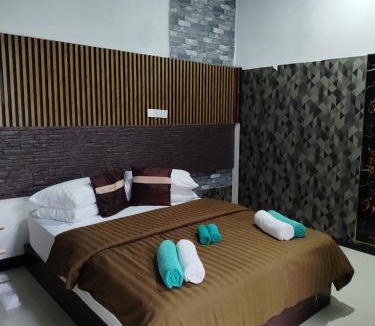 Thoddoo House | Palm Garden